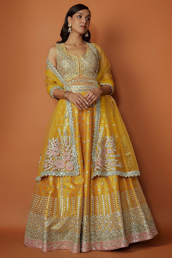 Yellow Slub Silk Mirror Embroidered Wedding Lehenga Set by Suhino at Pernia's Pop Up Shop
