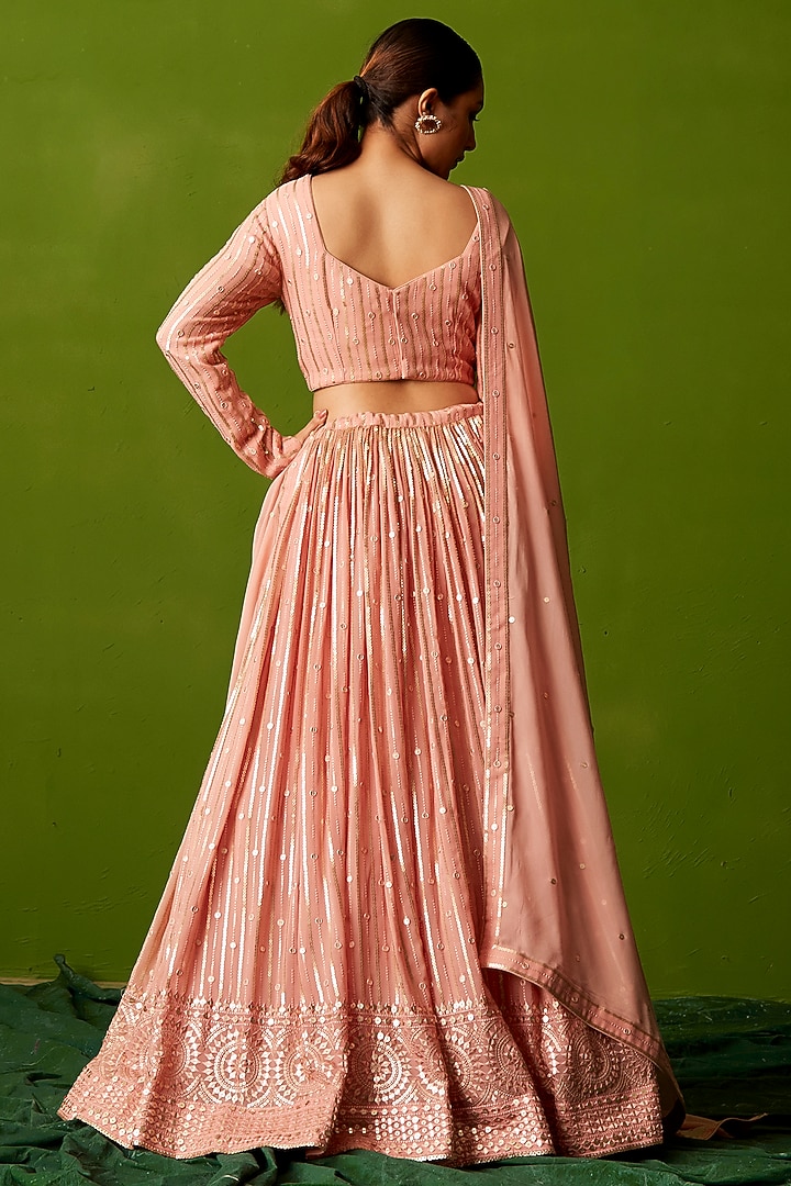 Peach Georgette Sequins Embroidered Wedding Lehenga Set by Suruchi Parakh at Pernia's Pop Up Shop