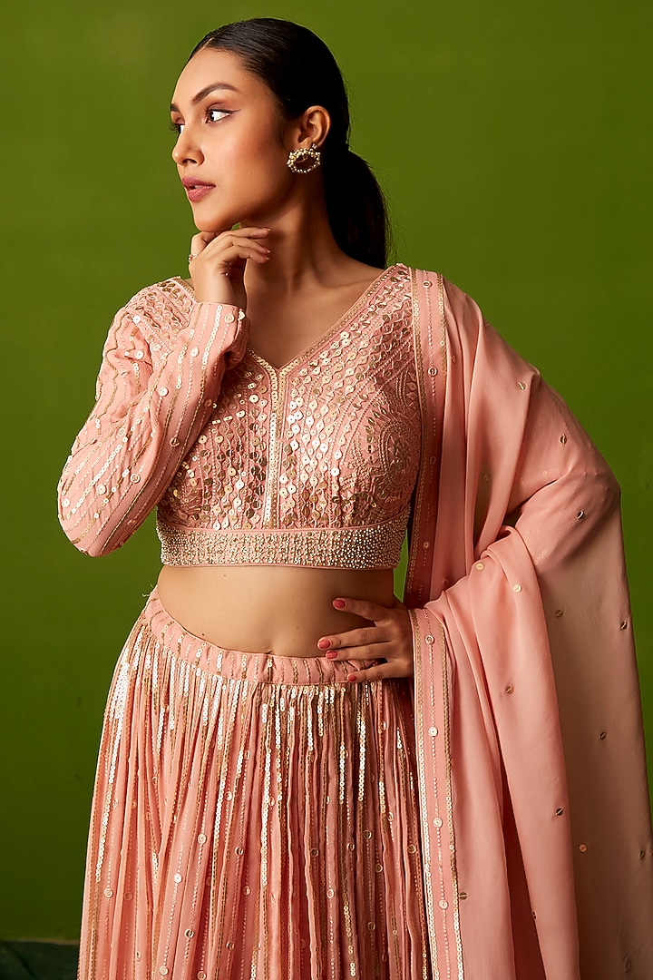 Peach Georgette Sequins Embroidered Wedding Lehenga Set by Suruchi Parakh at Pernia's Pop Up Shop