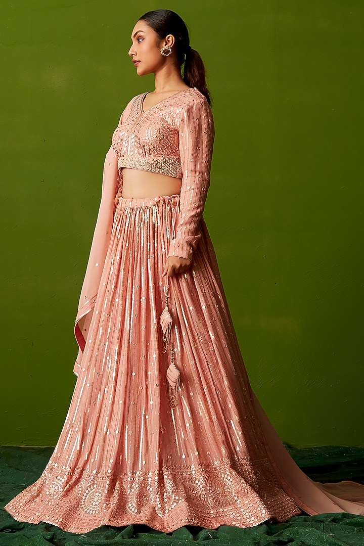 Peach Georgette Sequins Embroidered Wedding Lehenga Set by Suruchi Parakh at Pernia's Pop Up Shop