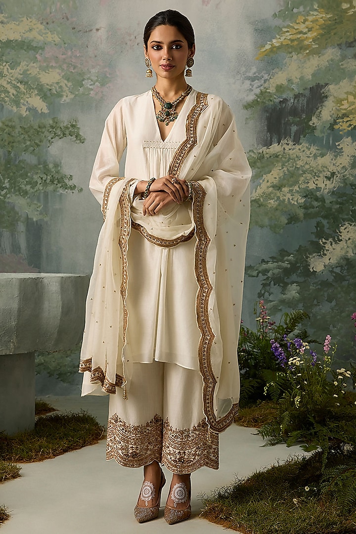 Ivory Silk Chanderi Aari Embellished Asymmetrical Kurta Set by Sureena Chowdhri at Pernia's Pop Up Shop