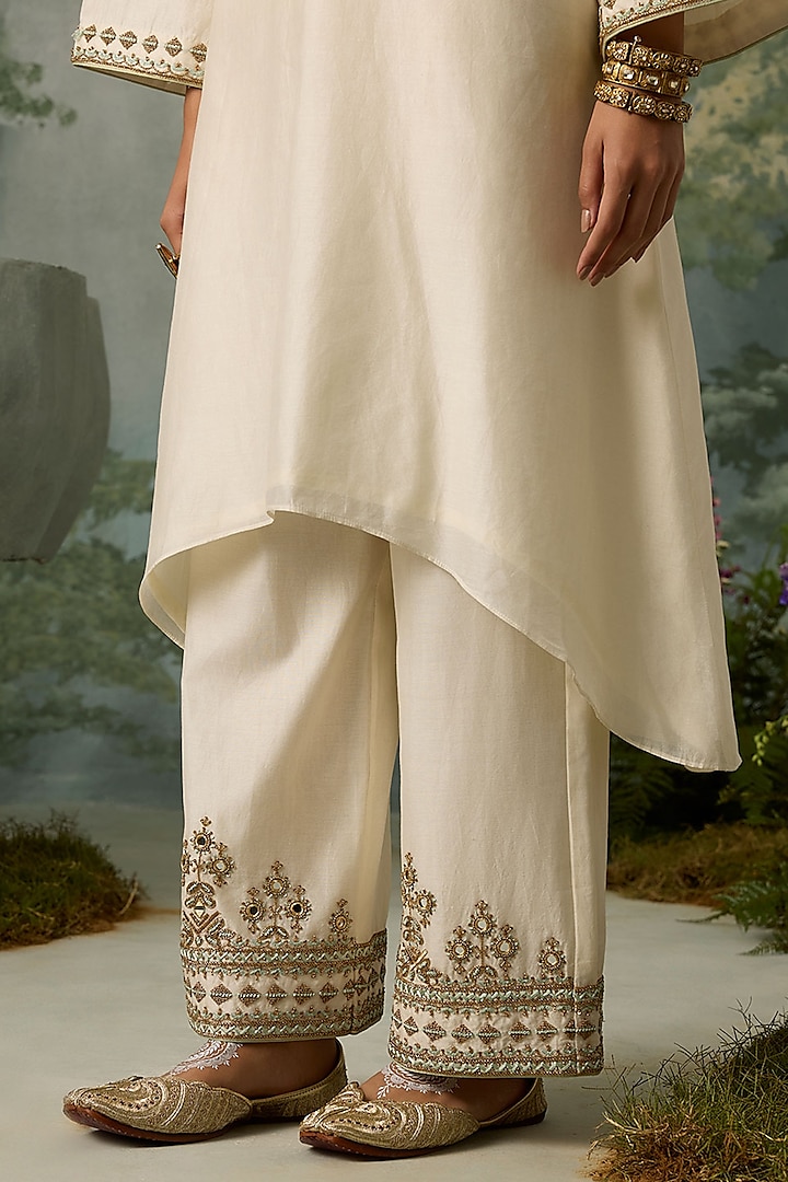 Ivory Silk Chanderi Asymmetrical Kurta Set by Sureena Chowdhri at Pernia's Pop Up Shop
