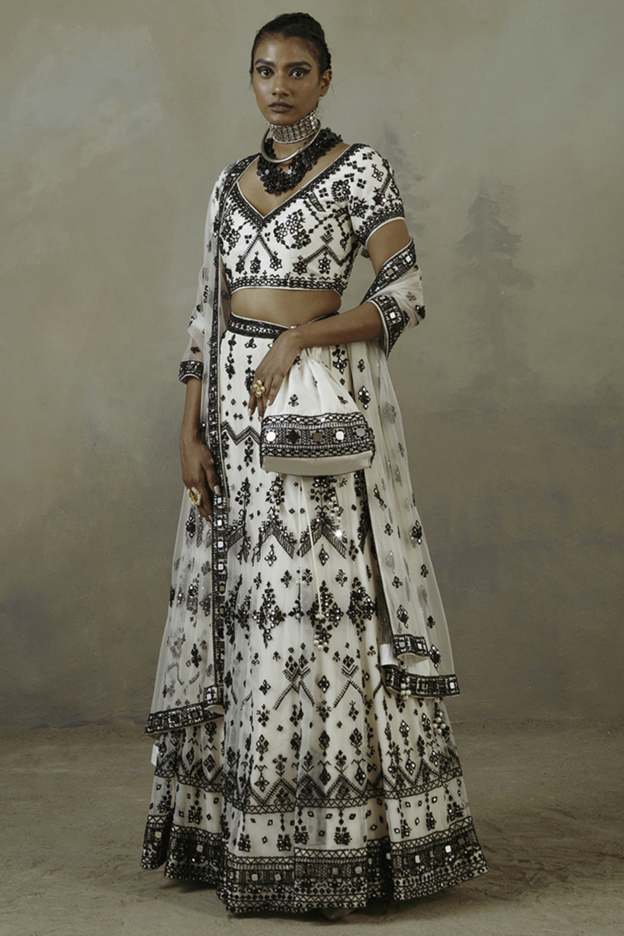 Ivory & Ebony Net Embroidered Wedding Lehenga Set by Sureena Chowdhri at Pernia's Pop Up Shop