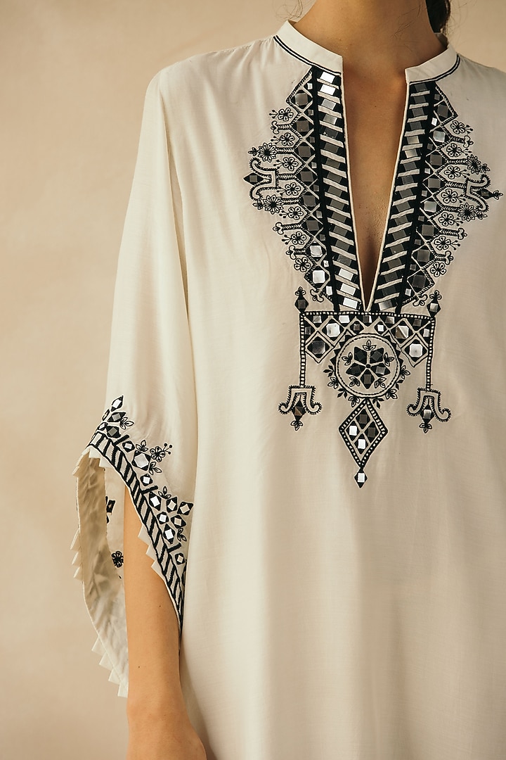Ivory Muslin Embroidered Asymmetrical Kaftan by Sureena Chowdhri at Pernia's Pop Up Shop