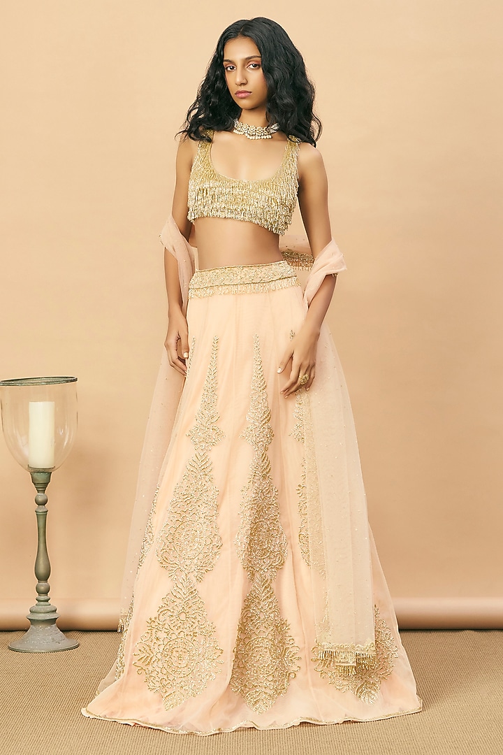 Peach Net Beads Embroidered Bridal Lehenga Set by SurilyG at Pernia's Pop Up Shop