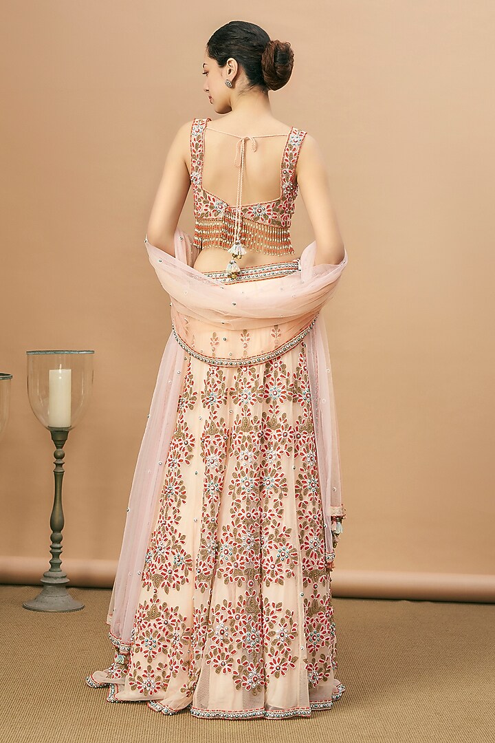 Peach Net Embroidered Bridal Lehenga Set by SurilyG at Pernia's Pop Up Shop