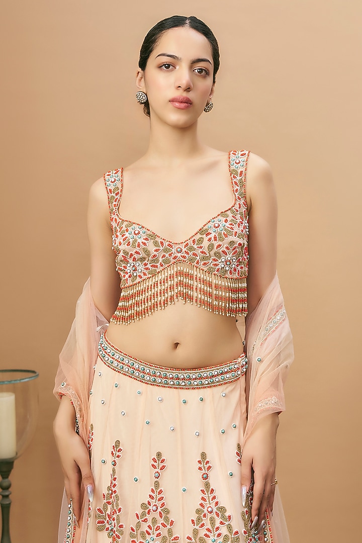 Peach Net Embroidered Bridal Lehenga Set by SurilyG at Pernia's Pop Up Shop