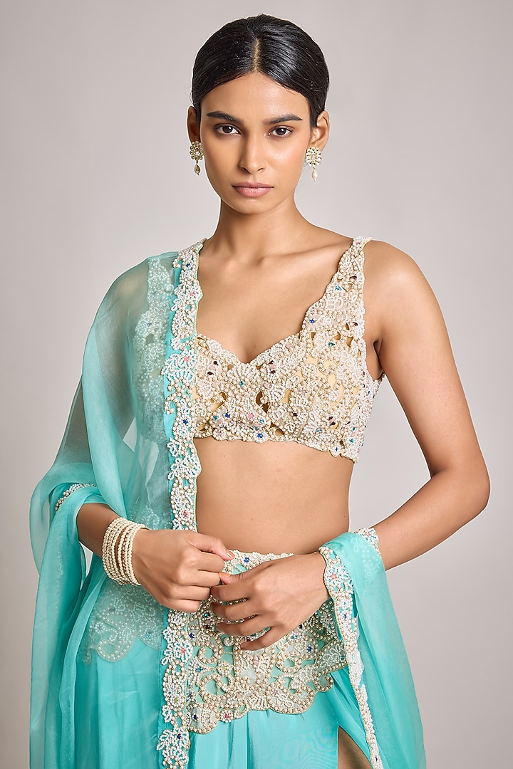 Turquoise Crepe & Net Pearl Embroidered Bridal Lehenga Set by SurilyG at Pernia's Pop Up Shop