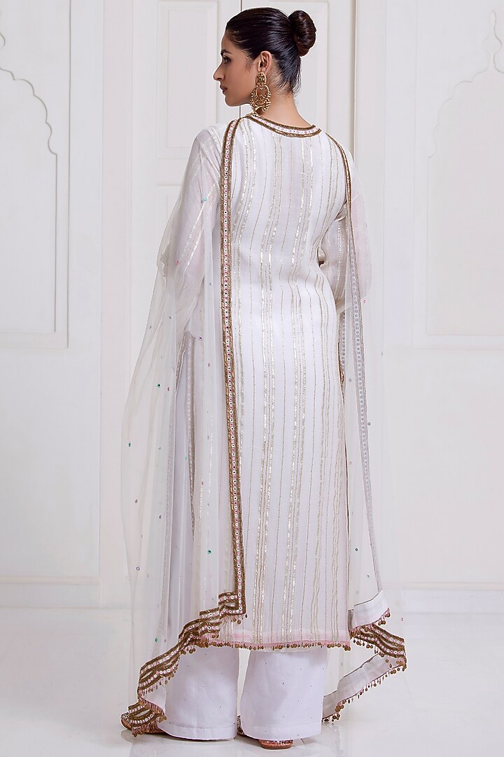 Ivory Embroidered Short Kurta Set by SurilyG at Pernia's Pop Up Shop