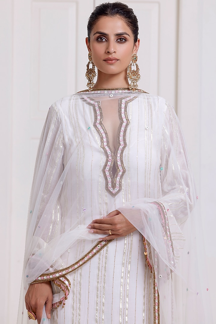 Ivory Embroidered Short Kurta Set by SurilyG at Pernia's Pop Up Shop