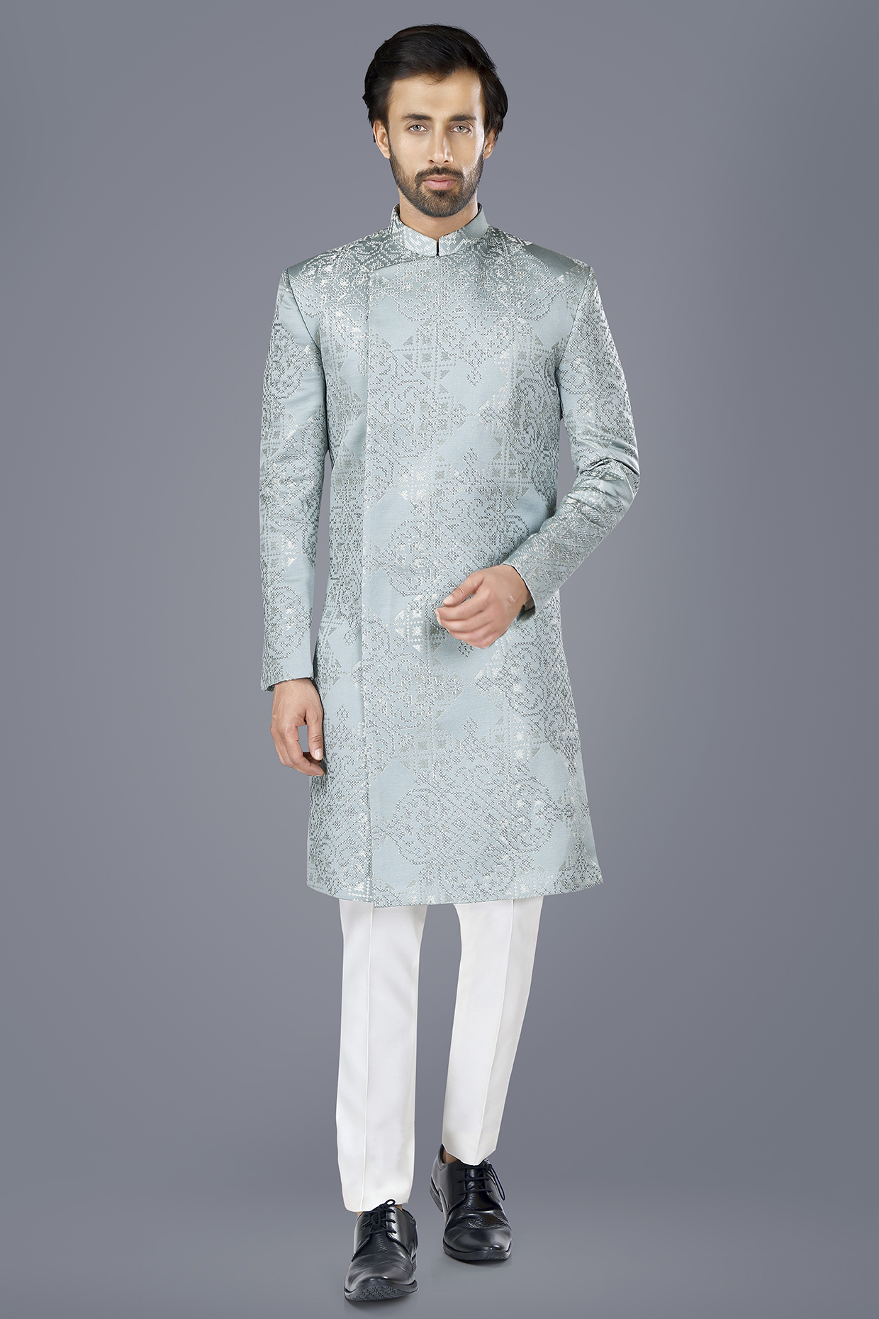 Aqua Blue Suiting Hand Embroidered Asymmetric Bandhgala Set by SURBHI PANSARI