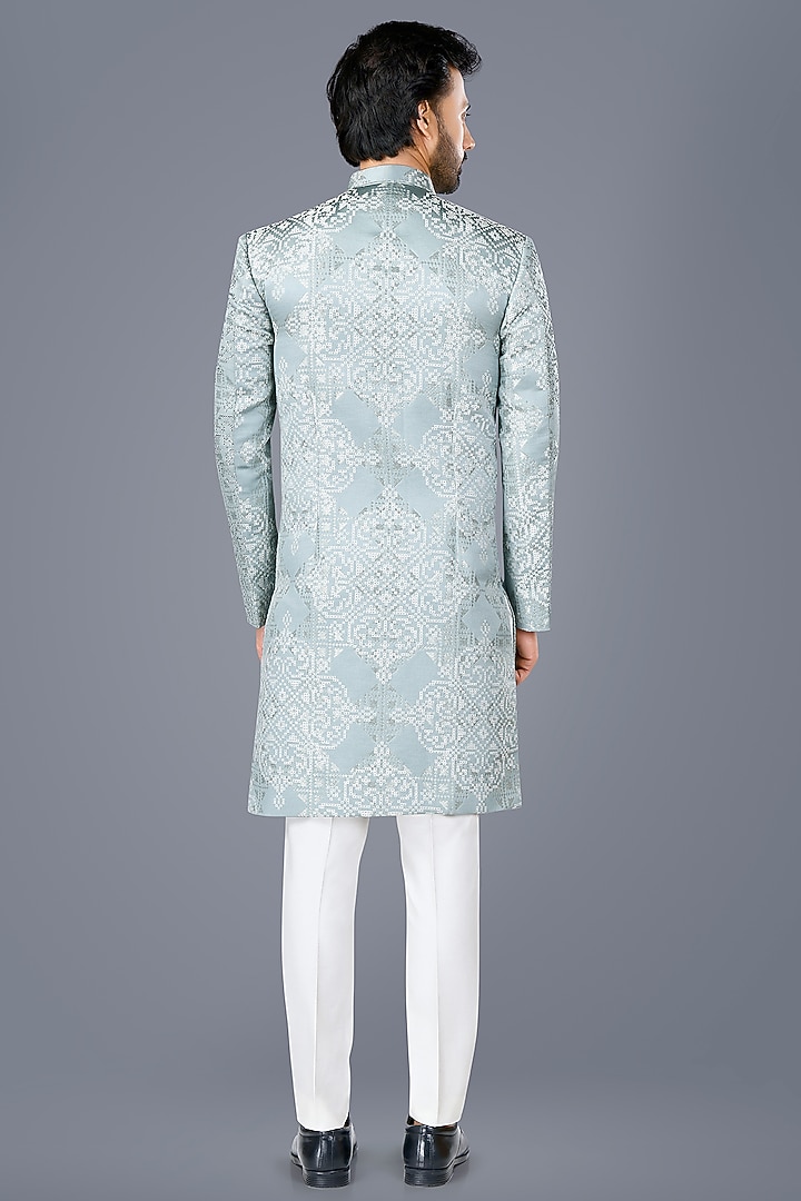 Aqua Blue Suiting Hand Embroidered Asymmetric Wedding Bandhgala Set by SURBHI PANSARI at Pernia's Pop Up Shop