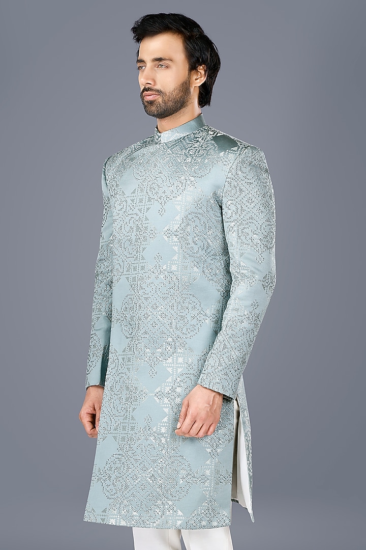 Aqua Blue Suiting Hand Embroidered Asymmetric Wedding Bandhgala Set by SURBHI PANSARI at Pernia's Pop Up Shop