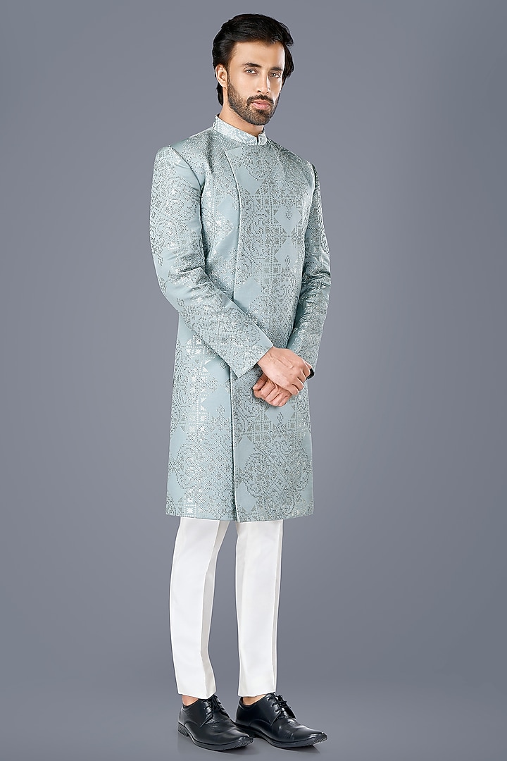 Aqua Blue Suiting Hand Embroidered Asymmetric Wedding Bandhgala Set by SURBHI PANSARI at Pernia's Pop Up Shop
