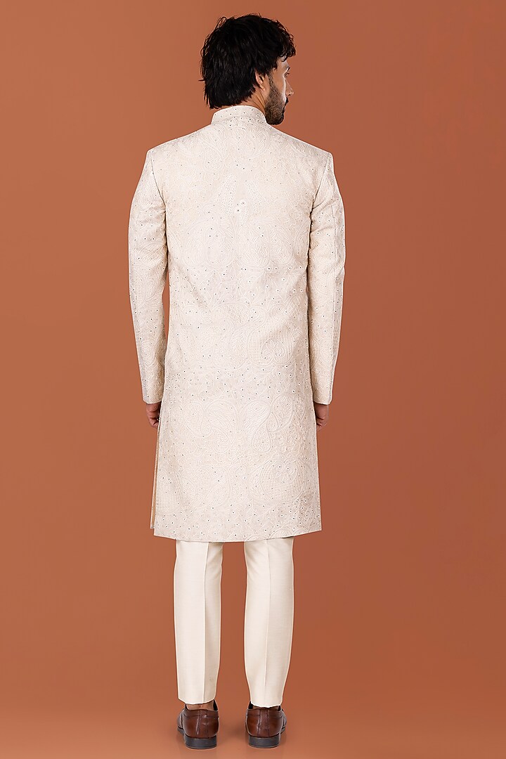 Pistachio Beige Cotton Silk Hand Embroidered Groom Sherwani Set
by SURBHI PANSARI at Pernia's Pop Up Shop