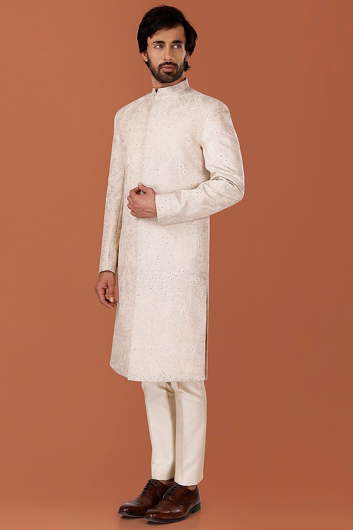 Pistachio Beige Cotton Silk Hand Embroidered Groom Sherwani Set
by SURBHI PANSARI at Pernia's Pop Up Shop