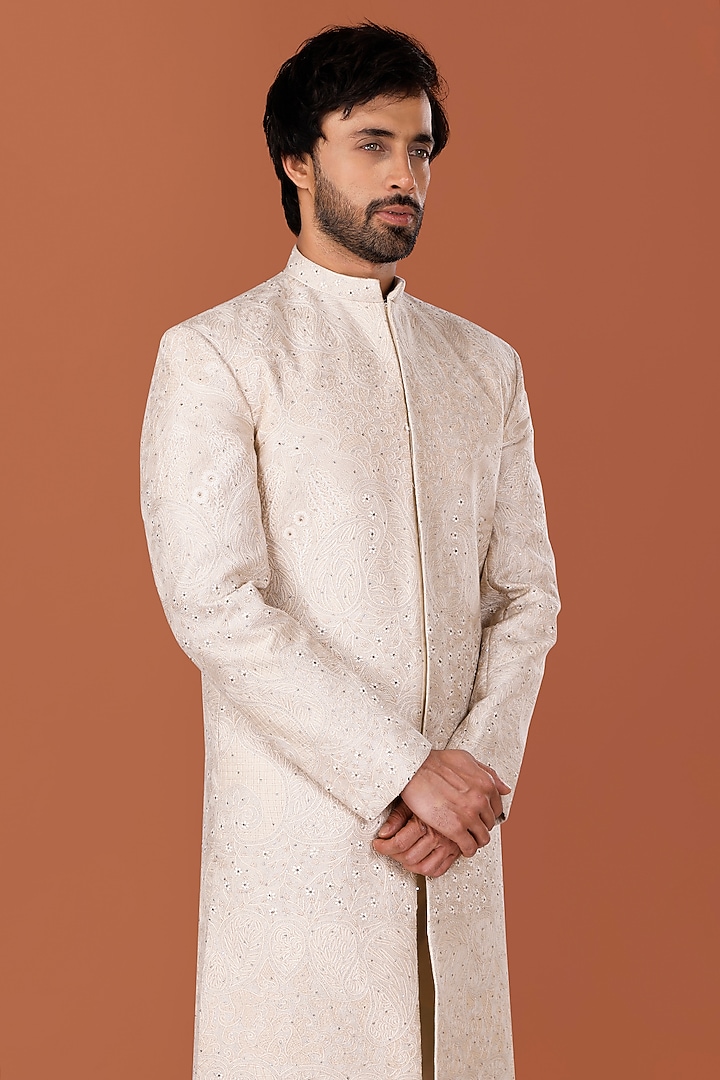 Pistachio Beige Cotton Silk Hand Embroidered Groom Sherwani Set
by SURBHI PANSARI at Pernia's Pop Up Shop