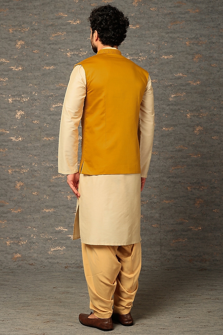 Sunset Yellow Self Textured Suiting Embroidered Nehru Jacket Set by SURBHI PANSARI at Pernia's Pop Up Shop