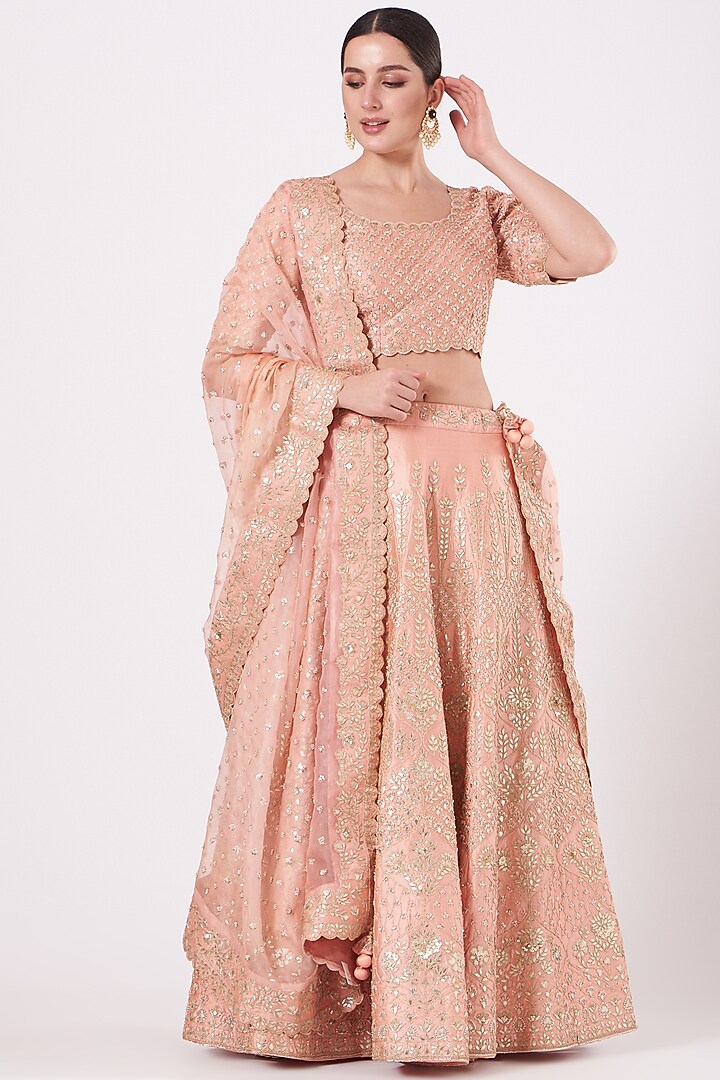 Peach Hand Embroidered Bridal Lehenga Set by SURBHI SHAH at Pernia's Pop Up Shop