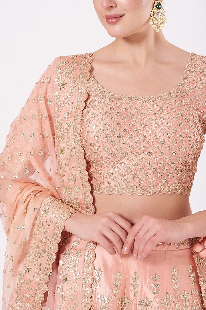 Peach Hand Embroidered Bridal Lehenga Set by SURBHI SHAH at Pernia's Pop Up Shop