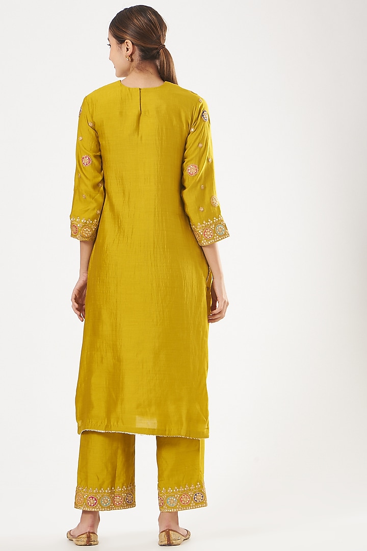 Mustard Hand Embroidered Kurta Set by SURBHI SHAH at Pernia's Pop Up Shop
