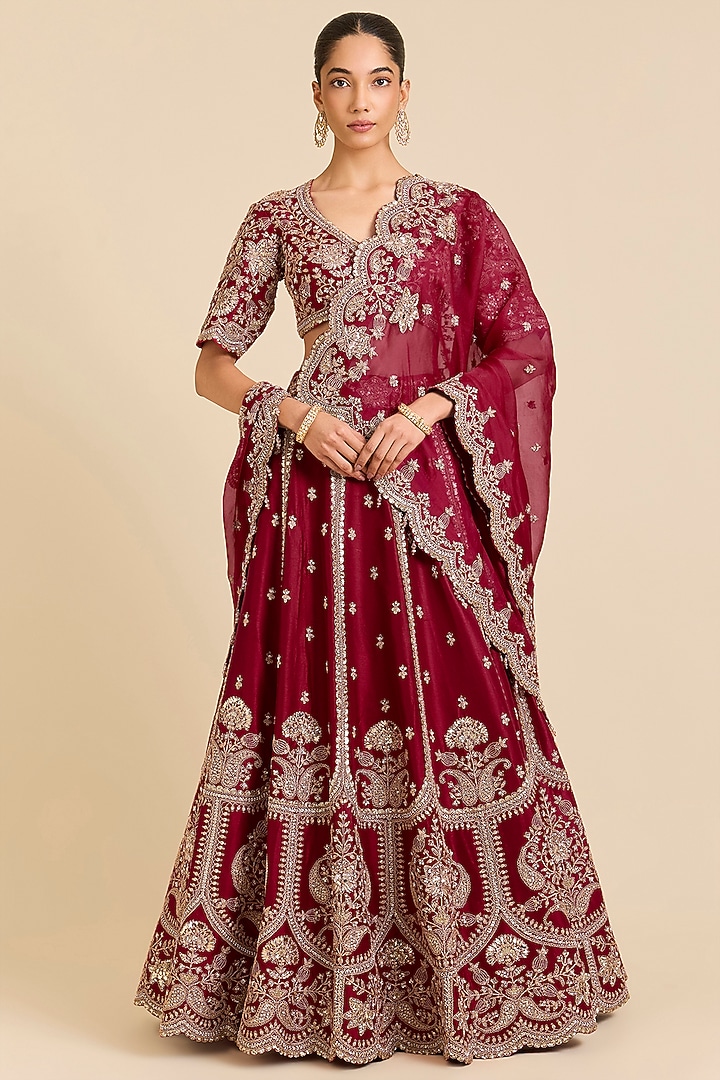 Maroon Dupion Silk Sequins Embroidered Bridal Lehenga Set by SURBHI SHAH at Pernia's Pop Up Shop