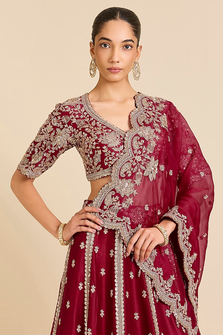 Maroon Dupion Silk Sequins Embroidered Bridal Lehenga Set by SURBHI SHAH at Pernia's Pop Up Shop