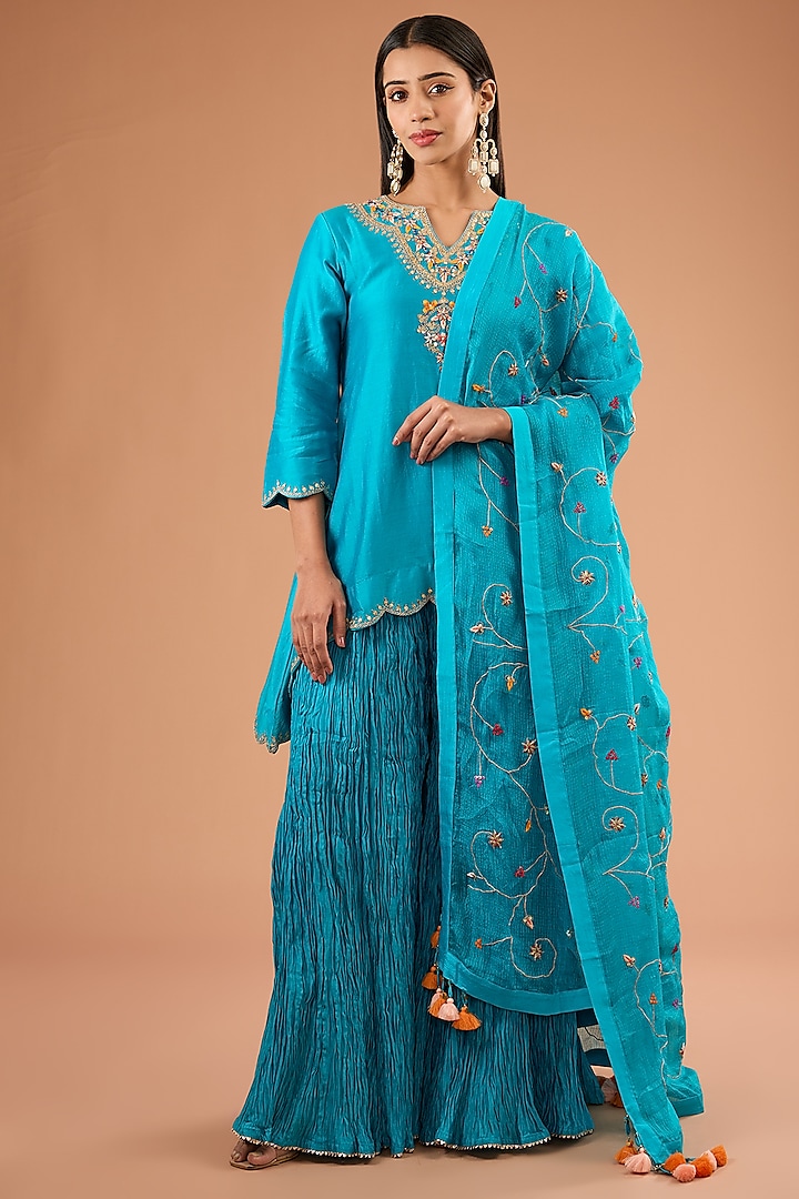 Turquoise Crushed Sharara Set by SURBHI SHAH at Pernia's Pop Up Shop