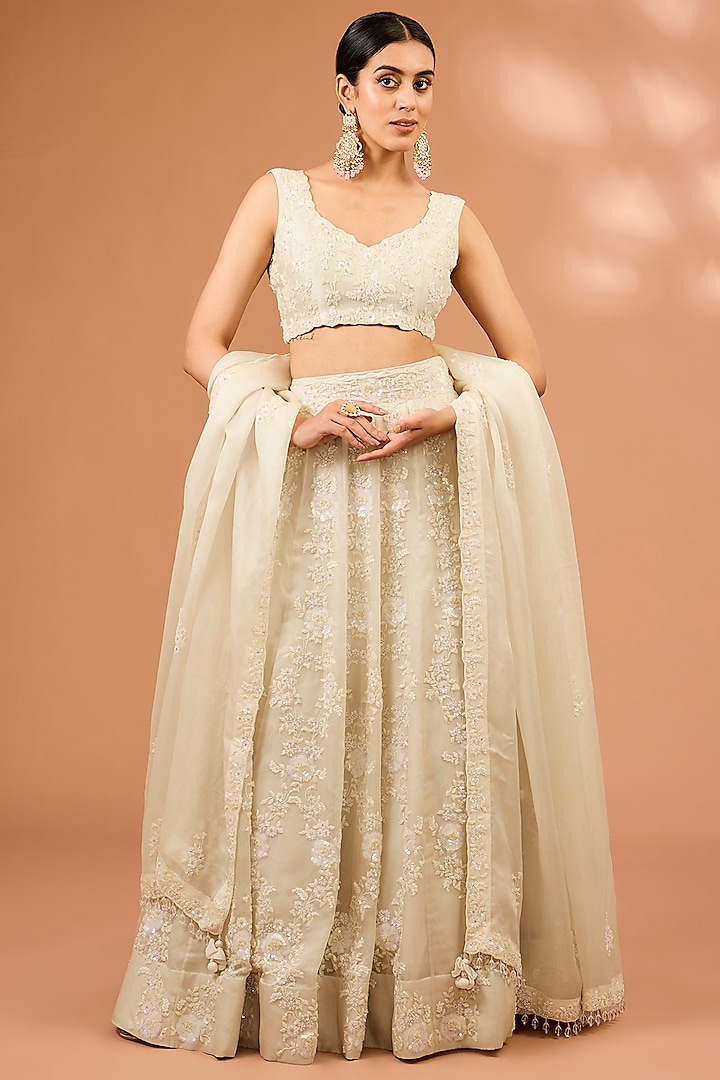 Ivory Satin Organza Sequins & Cutdana Work Bridal Lehenga Set by SURBHI SHAH at Pernia's Pop Up Shop
