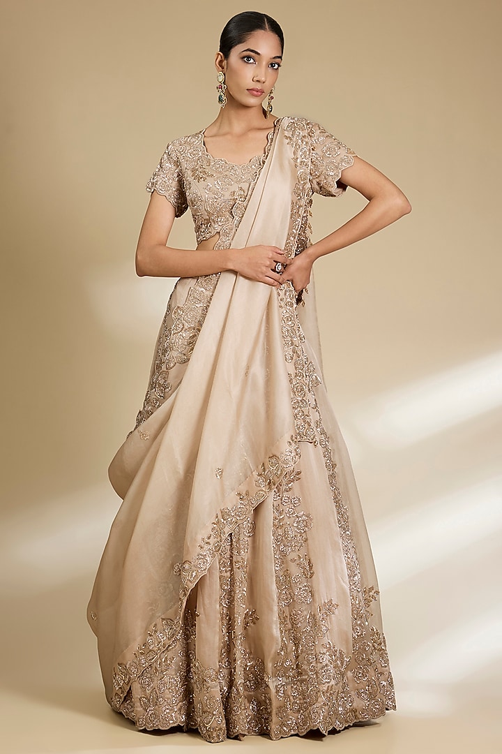 Beige Satin Organza Cutdana Embroidered Lehenga Set by SURBHI SHAH at Pernia's Pop Up Shop