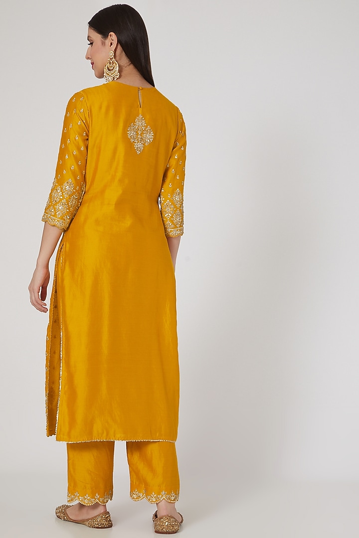 Mustard Hand Embroidered Kurta Set by SURBHI SHAH at Pernia's Pop Up Shop