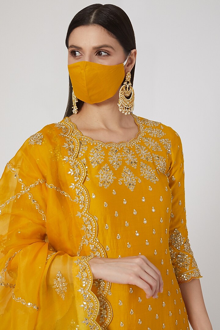 Mustard Hand Embroidered Kurta Set by SURBHI SHAH at Pernia's Pop Up Shop