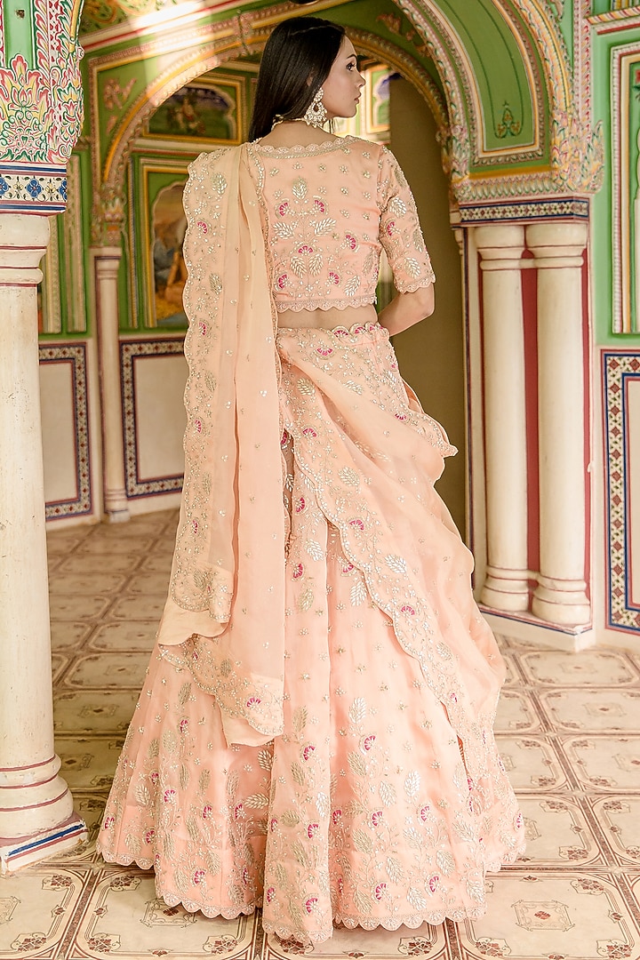 Powder Peach Pure Satin Organza Embroidered Bridal Lehenga Set by SURBHI SHAH at Pernia's Pop Up Shop