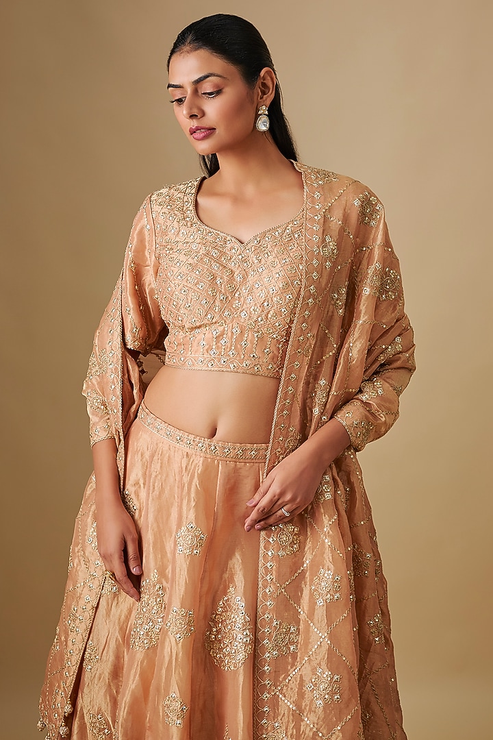 Deep Gold Tissue Marori Embroidered Bridal Lehenga Set by SURBHI SHAH at Pernia's Pop Up Shop