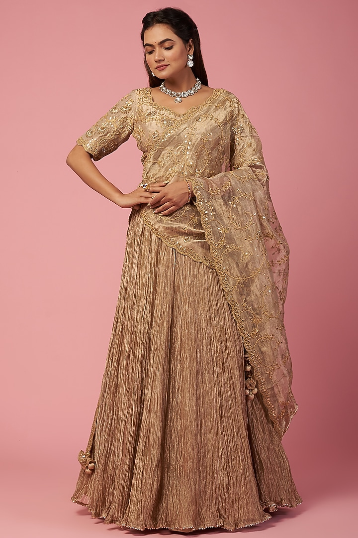 Dull Gold Hand Embroidered Wedding Lehenga Set by SURBHI SHAH at Pernia's Pop Up Shop