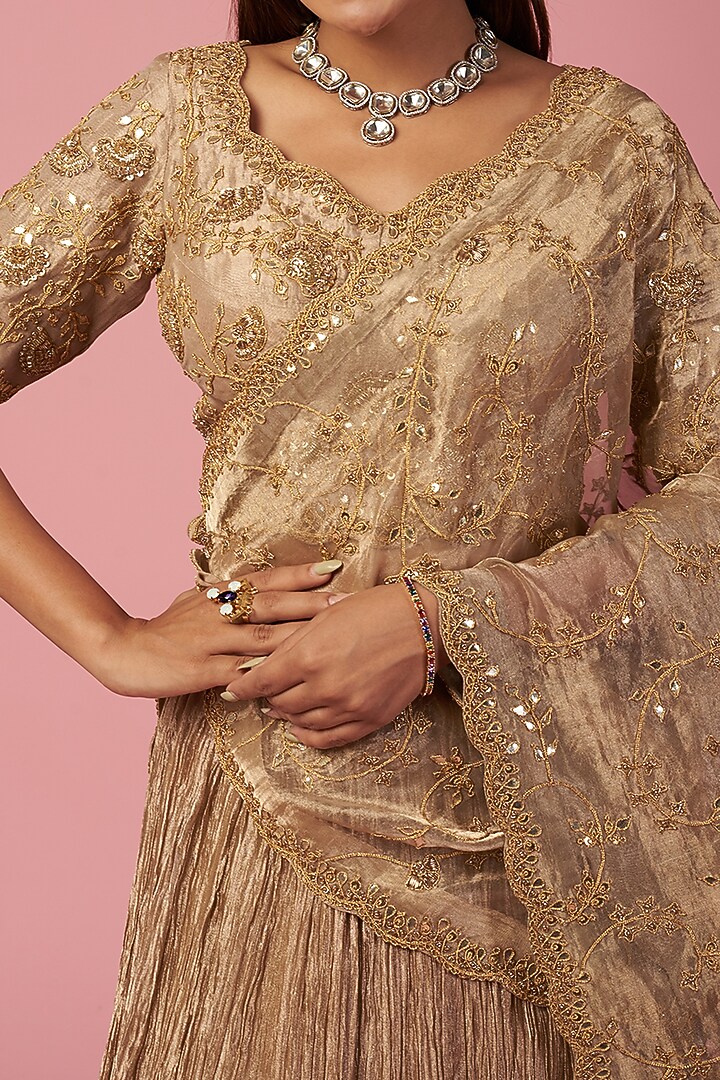 Dull Gold Hand Embroidered Wedding Lehenga Set by SURBHI SHAH at Pernia's Pop Up Shop