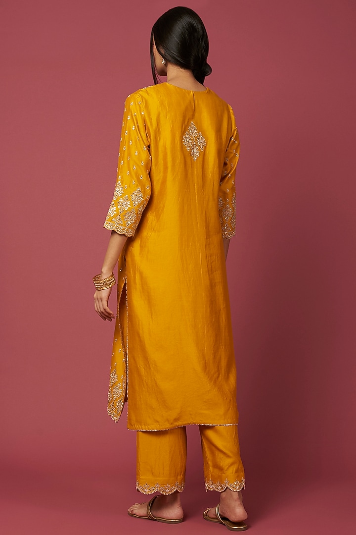 Mustard Yellow Embroidered Kurta Set by SURBHI SHAH at Pernia's Pop Up Shop