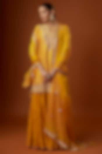 Mustard Yellow Bandhej Crushed Skirt Set by SURBHI SHAH