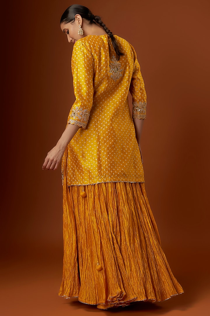 Mustard Yellow Bandhej Crushed Skirt Set by SURBHI SHAH at Pernia's Pop Up Shop