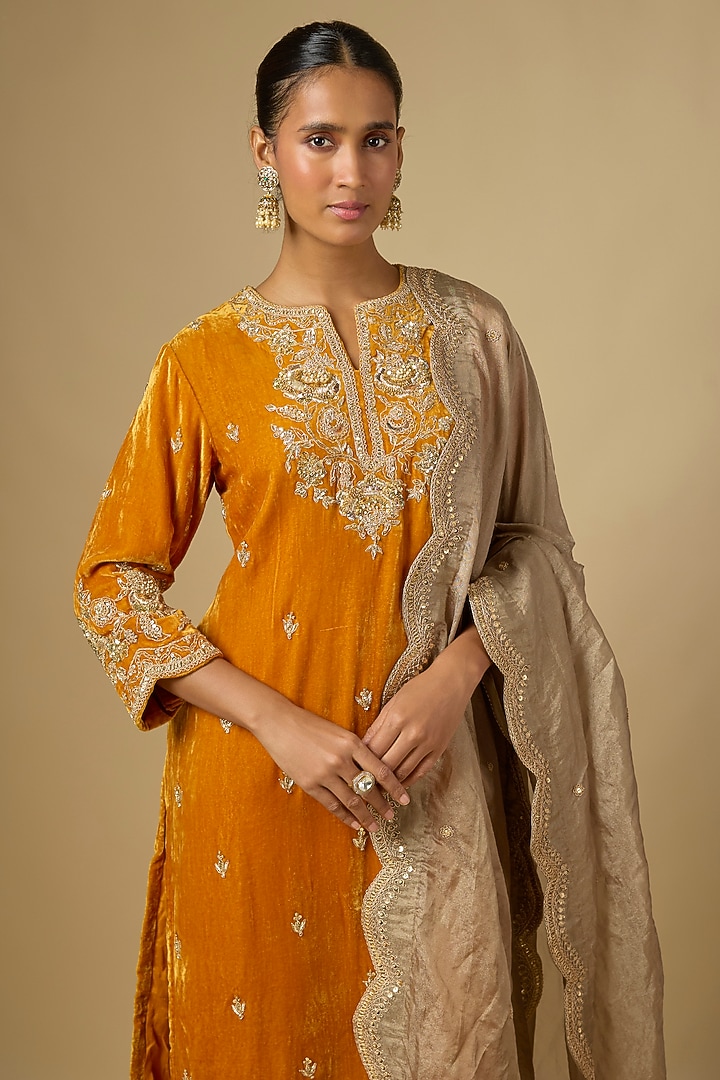 Mustard Velvet Zardosi Work Kurta Set by SURBHI SHAH at Pernia's Pop Up Shop