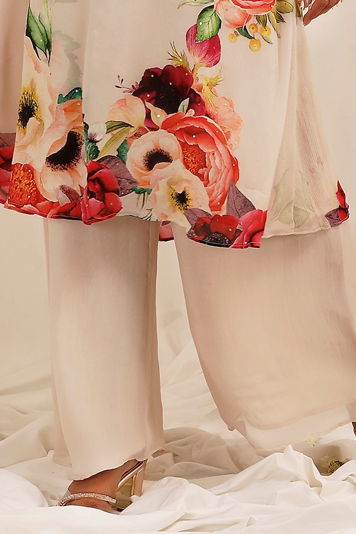 Pale Peach Chinnon Floral Printed & Embroidered Kurta Set by Surkh Syahi at Pernia's Pop Up Shop