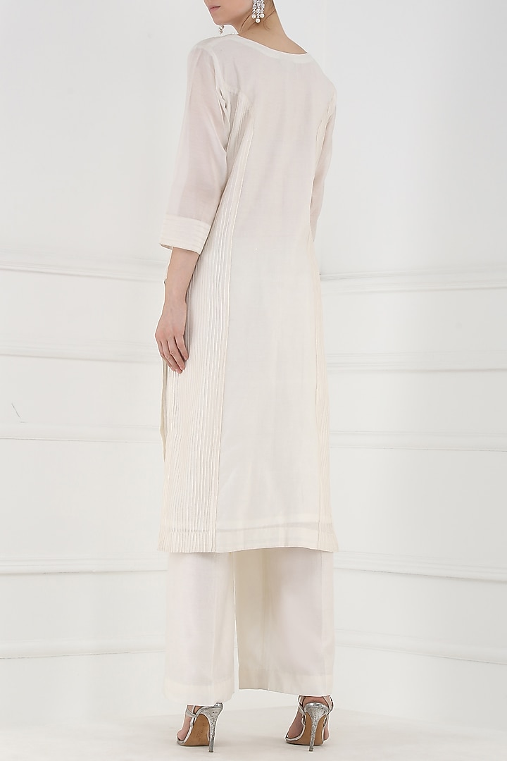 White thread embroidered kurta and palazzo pants set available only at Pernia's Pop Up Shop.