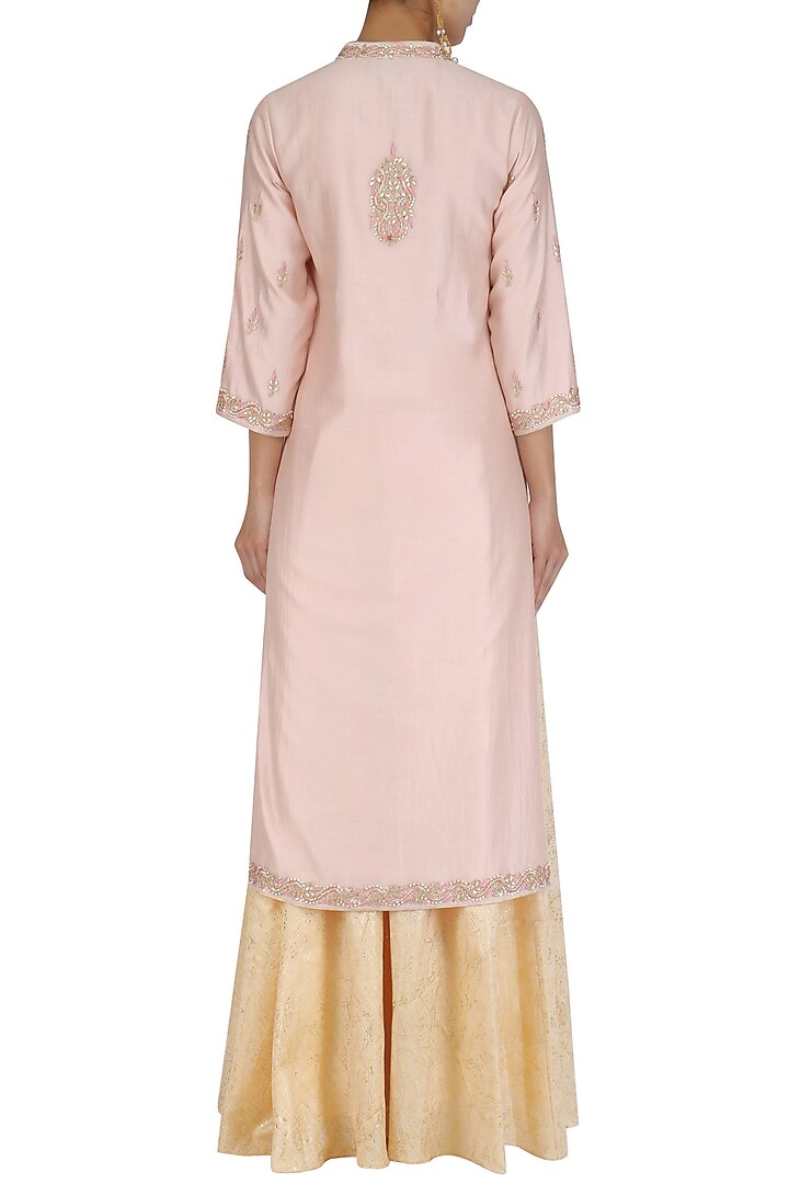 Pink hand embroided straight jacket with white skirt available only at Pernia's Pop Up Shop.