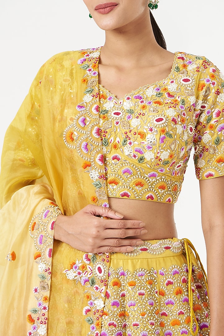 Yellow Spun Silk Embroidered Bridal Lehenga Set by SURBHI SHAH at Pernia's Pop Up Shop