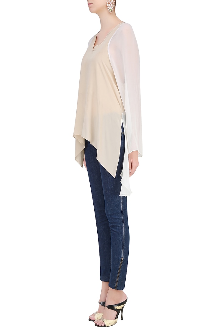 Cream asymmetric top available only at Pernia's Pop Up Shop.