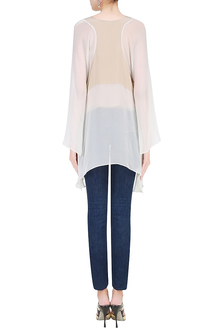 Cream asymmetric top available only at Pernia's Pop Up Shop.