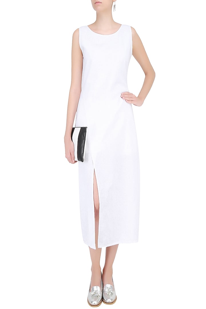 White dot print dress available only at Pernia's Pop Up Shop.