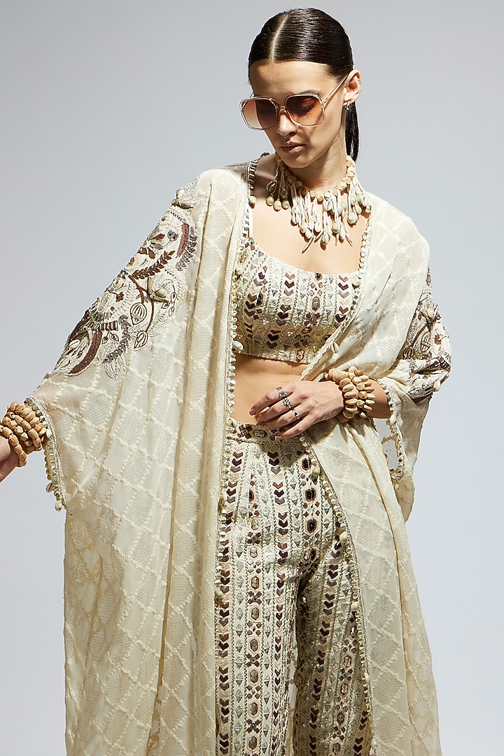 Ivory Silk Embellished Cape Set by SVA BY SONAM & PARAS MODI at Pernia's Pop Up Shop