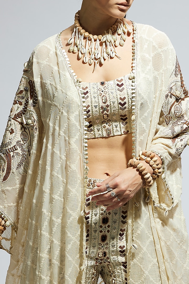 Ivory Silk Embellished Cape Set by SVA BY SONAM & PARAS MODI at Pernia's Pop Up Shop