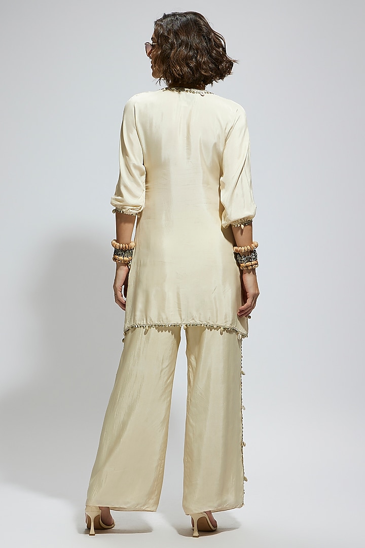 Ivory Silk Metal Embellished Co-Ord Set by SVA BY SONAM & PARAS MODI at Pernia's Pop Up Shop